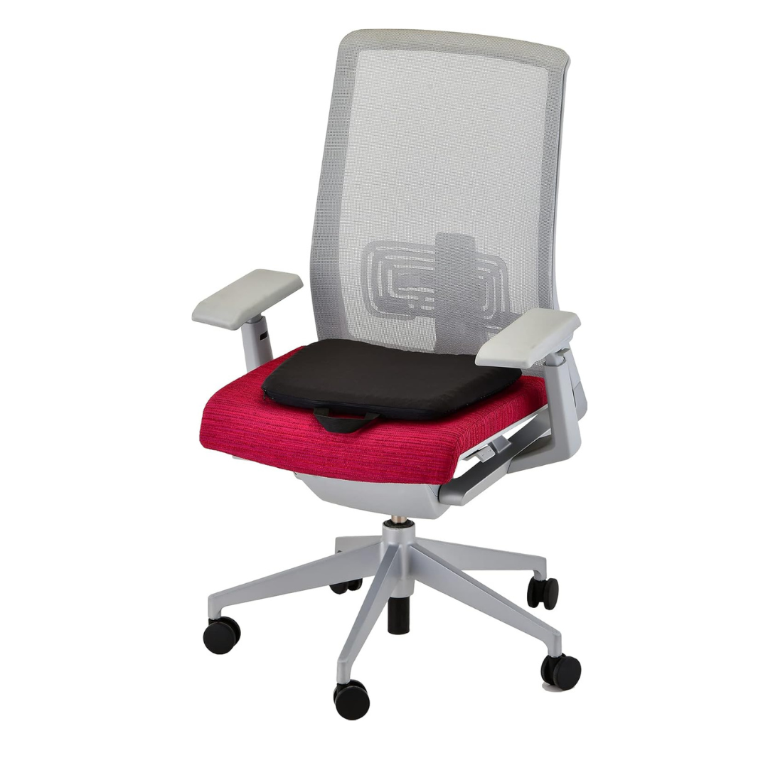 Ergonomic office chair with lumbar support, black mesh back, white armrests, red cushioned seat on a sturdy five-wheel base. Includes Nova Medical Happy Collection Back and Lumbar Support Gel Cushions for pressure relief.